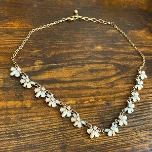 Silver necklace with white flowers